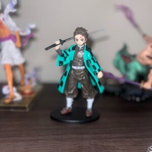 Anime Figure with Green and Black Checkered Coat